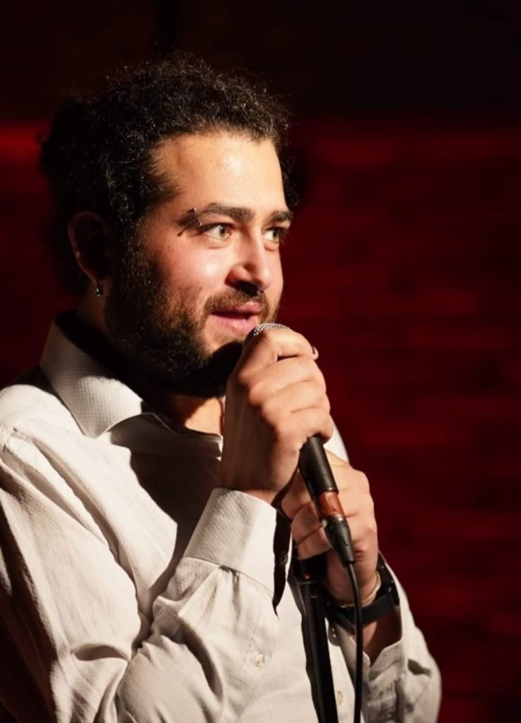 a man holding a microphone