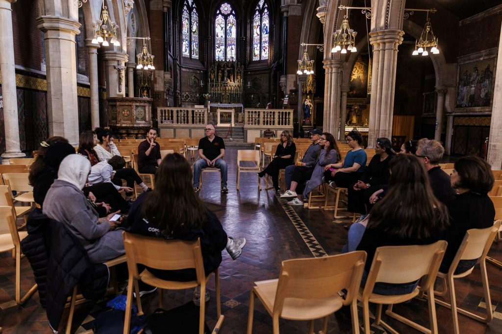 A group of people having meeting in the church